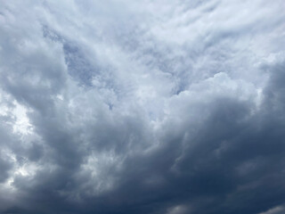 Looking up at dark rain clouds. Dramatic sky during storm