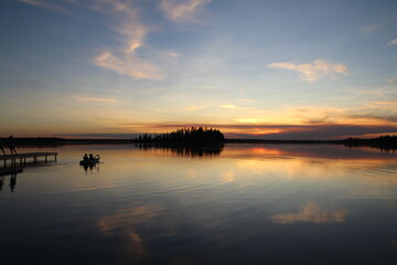 Fototapeta na wymiar Boating Into The Sunset, Elk Island National Park, Alberta