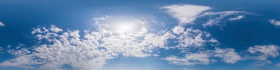 Obraz premium Blue sky panorama with Cirrus clouds. Seamless hdr 360 degree pano in spherical equirectangular format. Complete zenith for 3D visualization, game and sky replacement for aerial drone 360 panoramas.