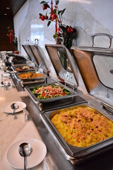buffet party catering with lo hei yu sheng, asian and western cuisine, canapé and butler, dessert and drink halal menu for Chinese new year decoration celebrate fine dining at luxury hotel restaurant