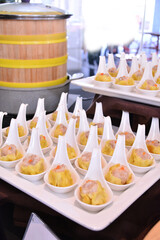 buffet party catering with lo hei yu sheng, asian and western cuisine, canapé and butler, dessert and drink halal menu for Chinese new year decoration celebrate fine dining at luxury hotel restaurant