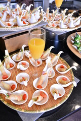 buffet party catering with lo hei yu sheng, asian and western cuisine, canapé and butler, dessert and drink halal menu for Chinese new year decoration celebrate fine dining at luxury hotel restaurant