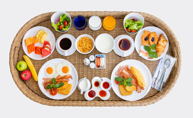 Breakfast set serve in the floating bamboo basket on white background. This photo have clipping path.