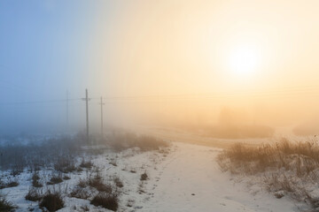 electric poles in the winter season, installed in the field