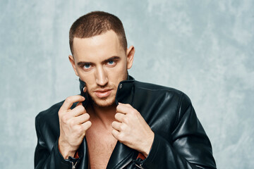 handsome man in leather black jacket fashion confidence to you Studio