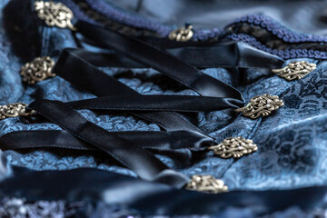 Close-up of details and buttons of a dirndl, bavarian folk costume
