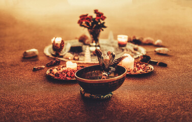beautiful tibetan bowl and candles, ceremonial space. - obrazy, fototapety, plakaty