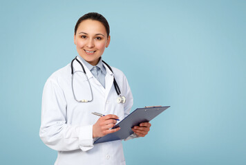 portrait of doctor woman in uniform on blue