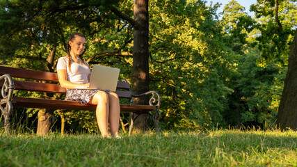 Girl computer tablet work outside. Student woman outdoor with business online technology in summer nature park. Person people with laptop. Happy hipster young distance learning concept.
