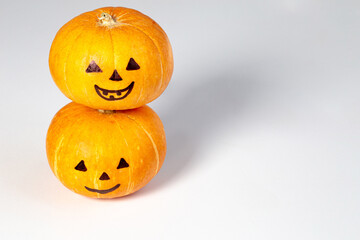 Halloween pumpkin with face isolated on white