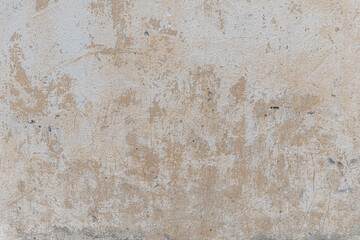 abstract background of an old shabby painted white wall close up