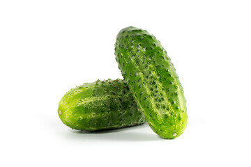 Two fresh cucumbers on an isolated white background