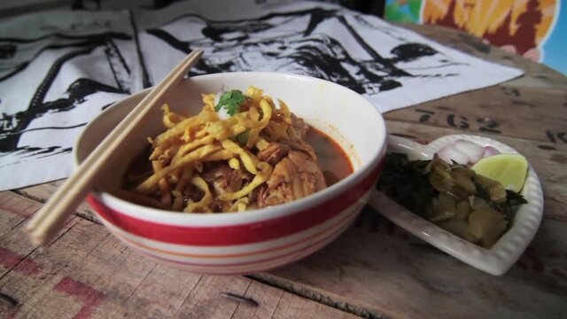 Khao soi - Traditional Thai Food, Thai curry with  A noodle dish in a yellow curry with chicken. 
Khao soy a famous northern Thai food
