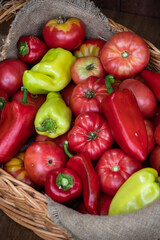 Photo still life in a rustic style a harvest of tomatoes and peppers