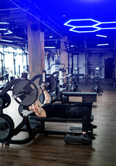 Fototapeta premium Healthy handsome in sportswear workout. Sportive lifestyle man training hard in gym.