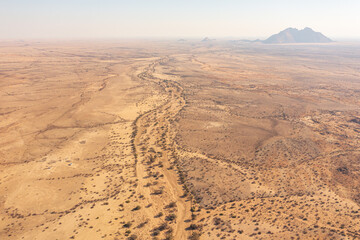 Fototapeta na wymiar Desert natural scenery, landforms in arid areas. Desert scenery in Namibia, Africa.