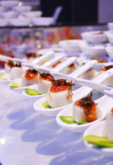 buffet party catering with lo hei yu sheng, asian and western cuisine, canapé and butler, dessert and drink halal menu for Chinese new year decoration celebrate fine dining at luxury hotel restaurant