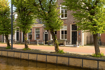 Facades of historic buildings in the picturesque village of Balk in the province of Friesland, Netherlands.