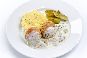 meatballs with mashed potato and sauce