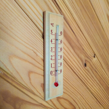 wooden weather thermometer on wooden wall square photo in perspective. for social media post and promotion