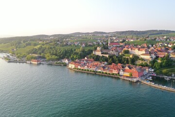 Naklejka na ściany i meble Cityscape of Meersburg at Lake Constance, Germany while golden hour
