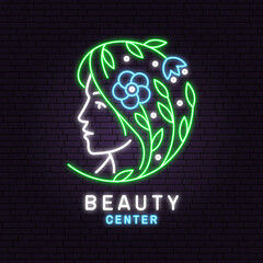 Neon sign. Woman face and flower with leafs logo, label, badge, emblem. Beauty center sign for cosmetics, jewellery, beauty and handmade products, tattoo studios. Linear trendy style. Vector