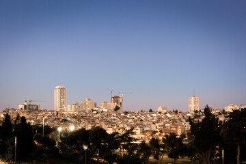 Fototapeta na wymiar Modern Jerusalem Cityscape at Nightfall in the Summer