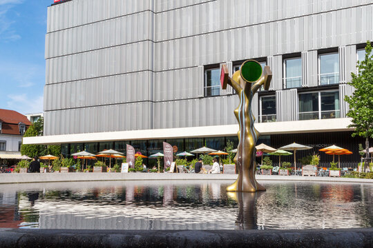 Basel, Switzerland - August 09. 2021: The Meret Oppenheim Fountain at the Meret Oppenheim square at the Basel railway station.