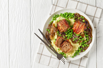 english meatballs, faggots with potatoes and peas