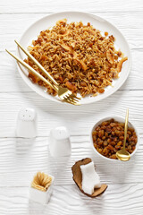Coconut Rice with raisins on a plate, top view