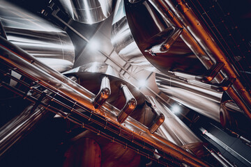 Rows of steel tanks for beer fermentation and maturation in a craft brewery