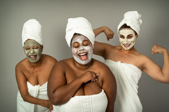 Happy Multiracial Women Having Skin Care Spa Day - People Selfcare Concept