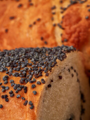 Homemade roll with poppy seeds and milk for breakfast