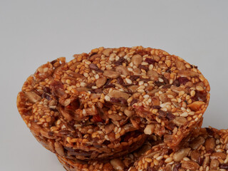 Homemade oatmeal cookies folded in a pile on the old table