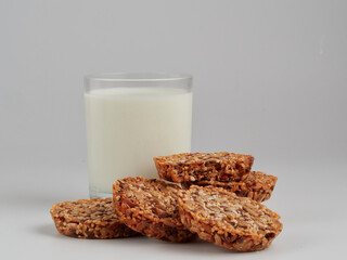 Homemade oatmeal cookies folded in a pile on the old table