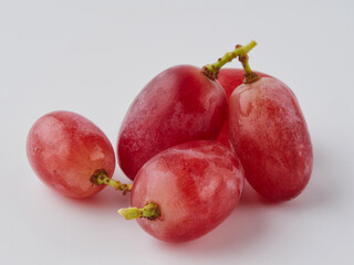 Grapes. Red grape. Grape branch isolated on white. With clipping path. Full depth of field.