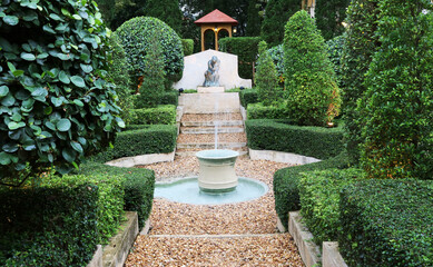 Ancient fountain in the english garden.