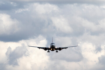 Plane in the sky before landing. Aircraft spotting.