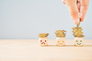 hand placing golden coin on the highest stack of coins, saving money, saving for retirement,...