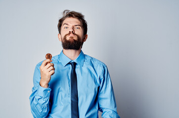man holding cryptocurrency finance office electronic money