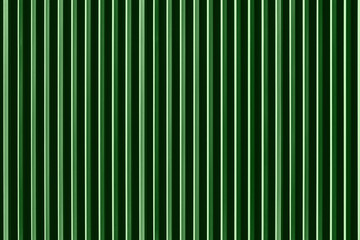 Green corrugated metal fence.