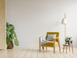 Yellow armchair and a wooden table in living room interior,white wall.