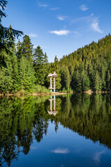alpine lake in the Carpathians in good summer weather. beautiful pond.