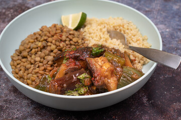 Vegan bowl: lentil and quinoa , eggplant in light blue bowl