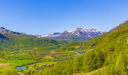Beautiful valley panorama Norway Hemsedal Skicenter with snowed in Mountains.