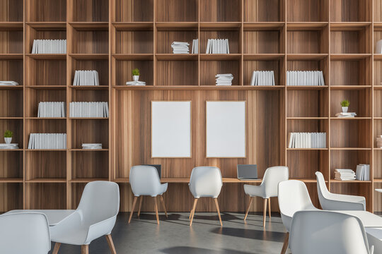 Two banners in a wall-to-wall & floor-to ceiling shelving with white details