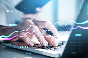 Various financial charts showing increase of price in stock market, digitalization and internet trading concept, close up of business woman hand typing laptop keyboard. Digital interface. Forex