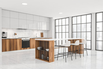 Bright kitchen room interior with table and three bar stool