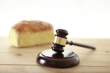 Judge's gavel with bread.Law concept