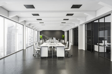Grey office space with ceiling ledges, white desks and sliding doors